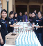 Cheerful volunteers involved in food distribution